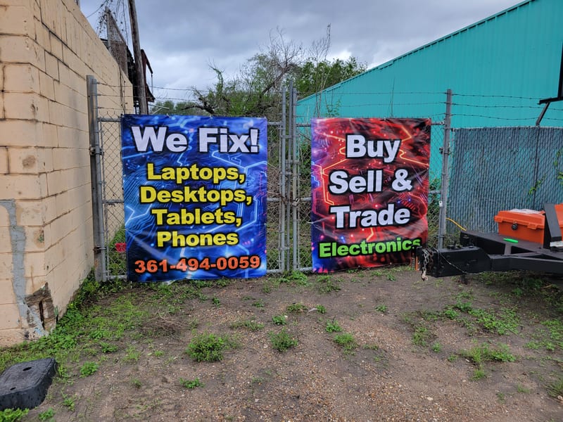 Wide-format NPC banner photographed on the shop floor