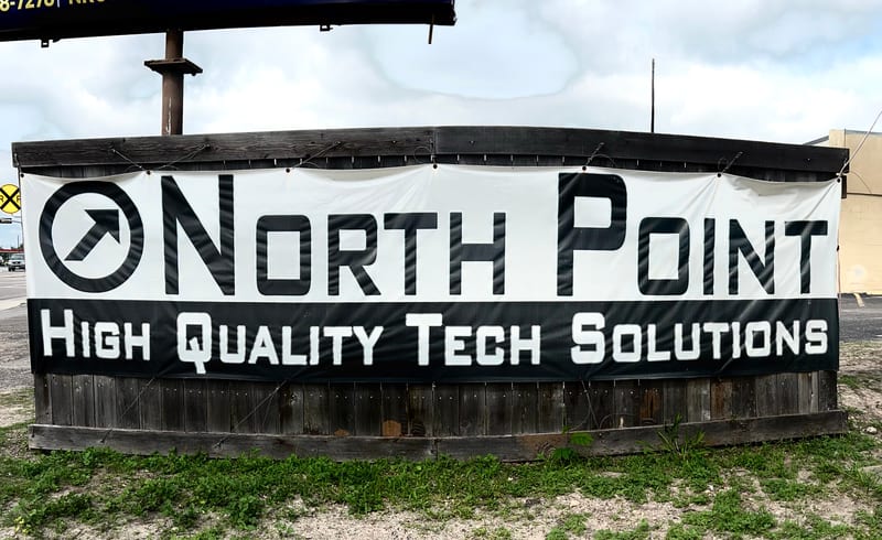 Black-and-white North Point High Quality Tech Solutions banner